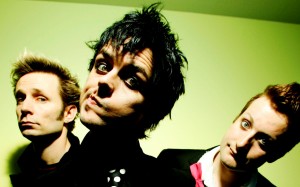 UNITED KINGDOM - JANUARY 01:  Photo of Billie Joe ARMSTRONG and GREEN DAY and Tre COOL and Mike DIRNT; L-R. Mike Dirnt, Billie Joe Armstrong, Tre Cool  (Photo by Nigel Crane/Redferns)